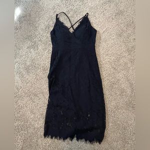 Dark blue lace dress. Zips in the back.